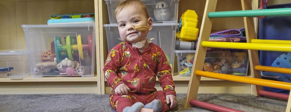 Chronic lung disease patient atticus at home with toys